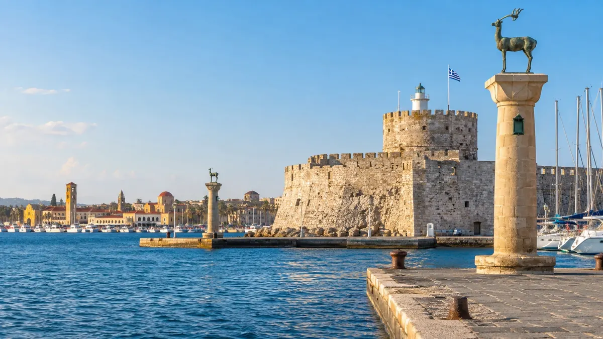 The historic harbor and old-town setting of Rhodes in bright Mediterranean light