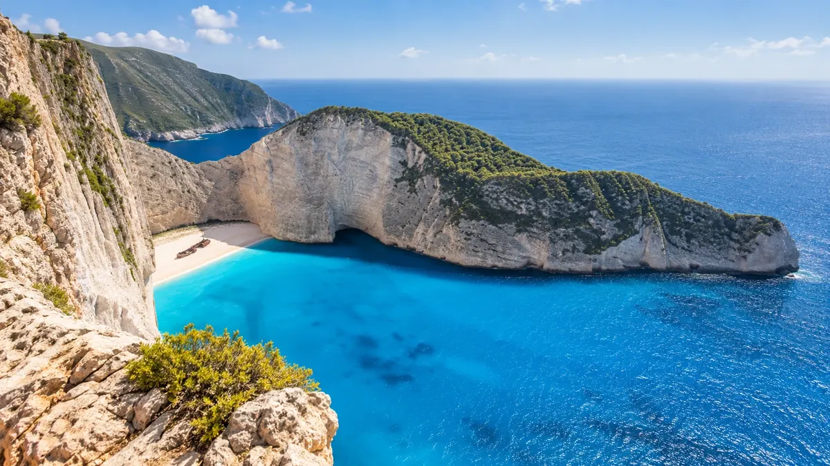 The dramatic cliffs and turquoise water of Zakynthos at Navagio Bay